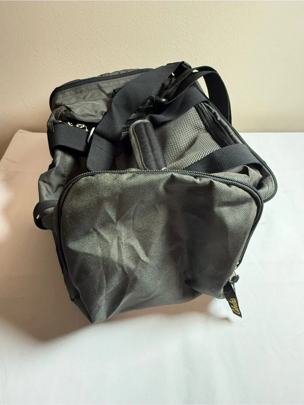 Cabela's Olive Green and Black Duffel Bag with Yellow Logo